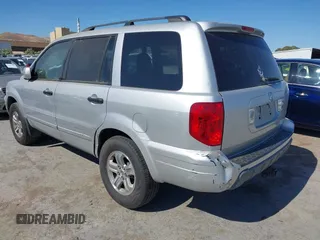2005 Honda Pilot EX-L z VIN 2HKYF18695H545804, wystawiony jako IAAI lot #42354721 z przebiegiem 228 914 mil mil oraz . Historia ofert i sprzedaży dostępna na DreamBid. Obrazek 3.