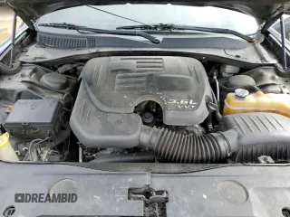 2013 Dodge Charger SXT z VIN 2C3CDXJG5DH730966, wystawiony jako Copart lot #56645314 z przebiegiem 198 160 mil mil oraz Szkoda całkowita • Salvage title. Historia ofert i sprzedaży dostępna na DreamBid. Obrazek 11.