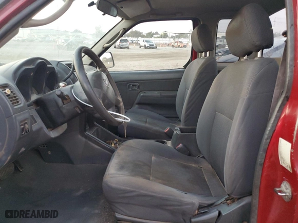 2002 Nissan Frontier 2WD XE with VIN 1N6DD26S02C393409, listed as a Copart auction lot 86197564 with 256,409 mi miles and Salvage Title. Bid and sale history available at carsss.com. Image 7.