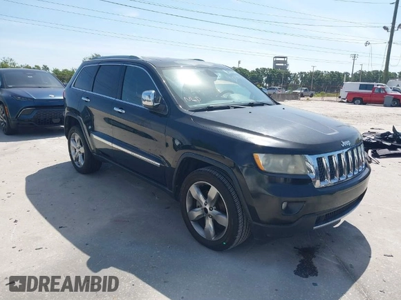2011 Jeep Grand Cherokee Overland with VIN 1J4RS6GT4BC584029, listed as a IAAI auction lot 42088953 with 144,777 mi miles and . Bid and sale history available at DreamBid. Image 1.