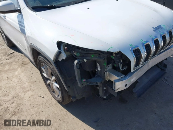 2016 Jeep Cherokee Limited with VIN 1C4PJLDB8GW256788, listed as a IAAI auction lot 41657339 with 104,630 mi miles. Bid and sale history available at carsss.com. Image 6.