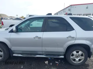 2006 Acura MDX with VIN 2HNYD18216H525330, listed as a IAAI auction lot 41637522 with 221,104 mi miles. Bid and sale history available at carsss.com. Image 14.