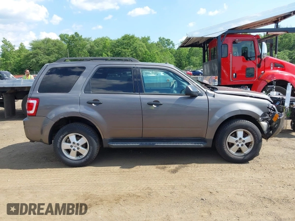 2012 Ford Escape XLT with VIN 1FMCU9D75CKC22907, listed as a IAAI auction lot 42571195 with 198,537 mi miles and . Bid and sale history available at DreamBid. Image 13.