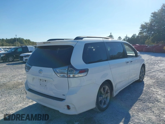 2014 Toyota Sienna SE with VIN 5TDXK3DC4ES487772, listed as a IAAI auction lot 41218295 with 153,368 mi miles and . Bid and sale history available at DreamBid. Image 4.