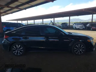 2024 Honda Civic EX-L z VIN 19XFL1H73RE008252, wystawiony jako IAAI lot #42085672 z przebiegiem 15 368 mil mil oraz . Historia ofert i sprzedaży dostępna na DreamBid. Obrazek 13.
