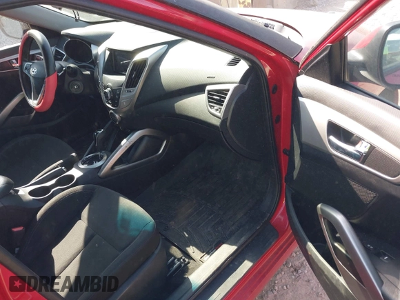 2014 Hyundai Veloster with VIN KMHTC6AD2EU214847, listed as a IAAI auction lot 42067728 with 77,421 mi miles. Bid and sale history available at carsss.com. Image 5.