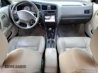 2000 Infiniti G20 Luxury z VIN JNKCP11A5YT303404, wystawiony jako Copart lot #82801234 z przebiegiem 178 185 mil mil oraz Tytuł czysty. Historia ofert i sprzedaży dostępna na DreamBid. Obrazek 8.