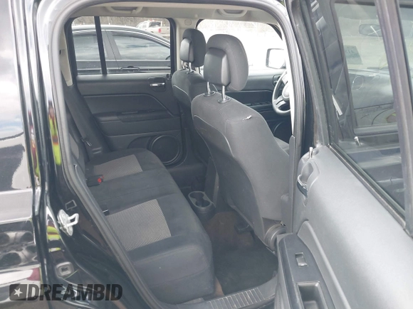 2014 Jeep Patriot Sport with VIN 1C4NJPBA4ED844253, listed as a IAAI auction lot 41879323 with 170,551 mi miles and . Bid and sale history available at carsss.com. Image 8.