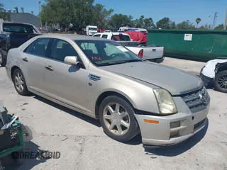 2008 Cadillac STS RWD with VIN 1G6DW67V780153199, listed as a IAAI auction lot 42058808 with 164,961 mi miles and . Bid and sale history available at DreamBid. Image 1.