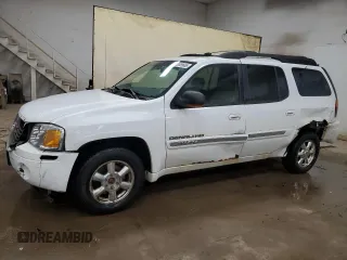 2003 GMC Envoy SLT z VIN 1GKET16S736148082, wystawiony jako Copart lot #53889665 z przebiegiem 179 774 mil mil oraz Tytuł czysty. Historia ofert i sprzedaży dostępna na DreamBid. Obrazek 1.