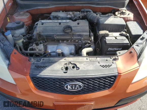 2009 Kia Rio SX with VIN KNADE223496514284, listed as a Copart auction lot 48550105 with 114,411 mi miles and Salvage Title. Bid and sale history available at carsss.com. Image 12.