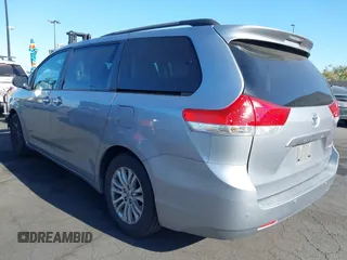 2013 Toyota Sienna XLE AAS with VIN 5TDYK3DC8DS318180, listed as a IAAI auction lot 42374479 with 189,977 mi miles and . Bid and sale history available at DreamBid. Image 3.