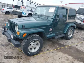 1999 Jeep Wrangler Sahara with VIN 1J4FY49S5XP482037, listed as a IAAI auction lot 42341723 with 161,081 mi miles and . Bid and sale history available at DreamBid. Image 18.