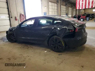 2024 Tesla Model 3 Long Range with VIN 5YJ3E1EBXRF818977, listed as a Copart auction lot 47303885 with 14,189 mi miles and Salvage Title. Bid and sale history available at DreamBid. Image 2.