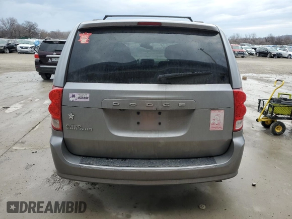 2019 Dodge Grand Caravan SE with VIN 2C4RDGBG2KR777707, listed as a Copart auction lot 46870455 with 129,404 mi miles and Clean Title. Bid and sale history available at DreamBid. Image 6.