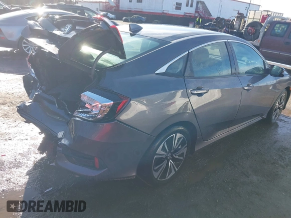2017 Honda Civic Sedan EX-L with VIN 2HGFC1F70HH633263, listed as a IAAI auction lot 41511642 with 65,769 mi miles. Bid and sale history available at carsss.com. Image 4.