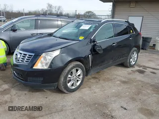 2013 Cadillac SRX Luxury Collection z VIN 3GYFNCE35DS607553, wystawiony jako IAAI lot #42151522 z przebiegiem 104 688 mil mil oraz . Historia ofert i sprzedaży dostępna na DreamBid. Obrazek 17.