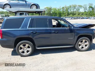 2020 Chevrolet Tahoe LT with VIN 1GNSKBKC6LR239081, listed as a IAAI auction lot 42298842 with 125,328 mi miles and . Bid and sale history available at DreamBid. Image 13.