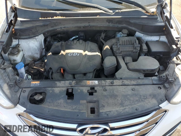 2014 Hyundai Santa Fe z VIN 5XYZTDLB9EG195651, wystawiony jako Copart lot #61422625 z przebiegiem 61 128 mil mil oraz Szkoda całkowita • Salvage title. Historia ofert i sprzedaży dostępna na DreamBid. Obrazek 12.
