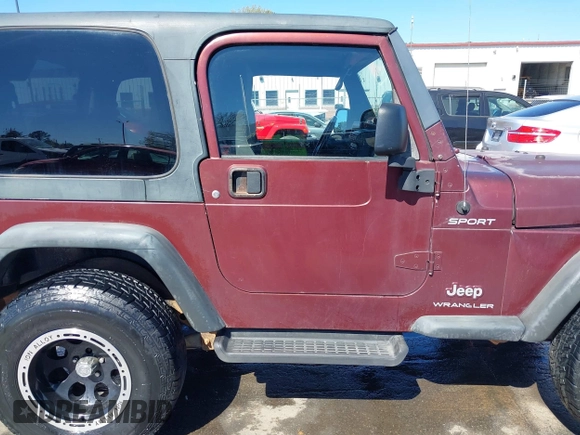 2003 Jeep Wrangler Sport with VIN 1J4FA49S33P345192, listed as a IAAI auction lot 41801344 with 196,472 mi miles. Bid and sale history available at carsss.com. Image 13.
