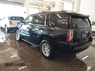 2020 GMC Yukon SLT with VIN 1GKS2BKC6LR232354, listed as a IAAI auction lot 41313325 with 107,960 mi miles. Bid and sale history available at carsss.com. Image 3.