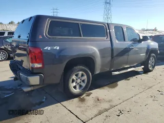 2010 GMC Sierra 1500 with VIN 1GTYKWE25AZ287603, listed as a Copart auction lot 79926284 with 122,683 mi miles and Salvage Title. Bid and sale history available at DreamBid. Image 3.