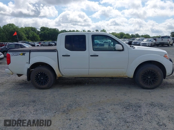 2018 Nissan Frontier SV with VIN 1N6AD0EV0JN744809, listed as a IAAI auction lot 42508839 with 99,049 mi miles and . Bid and sale history available at DreamBid. Image 13.
