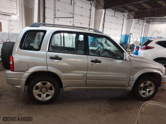 2000 Suzuki Grand Vitara JLX with VIN JS3TD62V1Y4101244, listed as a IAAI auction lot 41635060 with 169,951 mi miles. Bid and sale history available at carsss.com. Image 13.