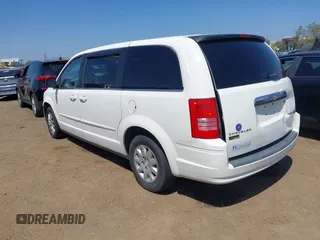 2009 Chrysler Town & Country LX with VIN 2A8HR44E79R549129, listed as a IAAI auction lot 42079369 with 102,805 mi miles. Bid and sale history available at carsss.com. Image 3.