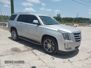 2015 Cadillac Escalade Premium z VIN 1GYS3NKJ0FR500158, wystawiony jako IAAI lot #42439343 z przebiegiem 159 487 mil mil oraz . Historia ofert i sprzedaży dostępna na DreamBid. Obrazek 1.