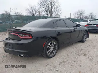 2019 Dodge Charger SXT with VIN 2C3CDXJG7KH757728, listed as a IAAI auction lot 41797017 with 68,063 mi miles and . Bid and sale history available at DreamBid. Image 4.