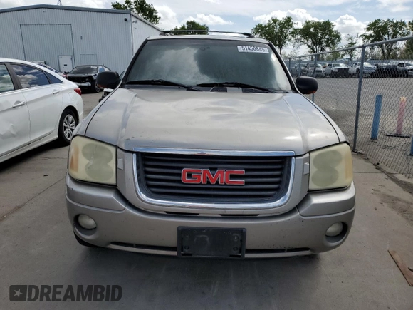 2002 GMC Envoy SLT with VIN 1GKDS13S022293912, listed as a Copart auction lot 51450845 with 0 mi miles and Salvage Title. Bid and sale history available at carsss.com. Image 5.