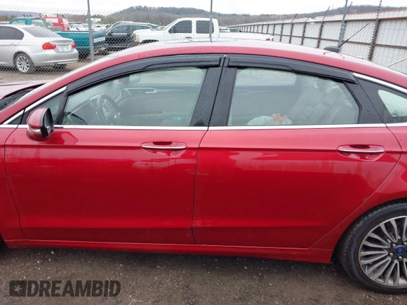 2017 Ford Fusion SE z VIN 3FA6P0H98HR175087, wystawiony jako IAAI lot #41557481 z przebiegiem 103 752 mil mil oraz . Historia ofert i sprzedaży dostępna na DreamBid. Obrazek 14.