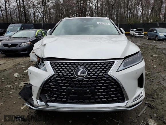 2022 Lexus RX with VIN JTJHZKFA5N2039857, listed as a Copart auction lot 42733963 with 7,011 mi miles. Bid and sale history available at carsss.com. Image 5.
