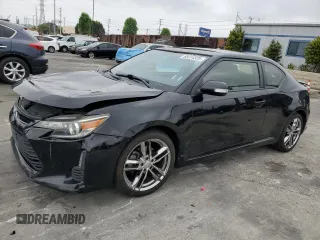 2015 Scion tC z VIN JTKJF5C75F3093123, wystawiony jako Copart lot #58414325 z przebiegiem 107 051 mil mil oraz Szkoda całkowita • Salvage title. Historia ofert i sprzedaży dostępna na DreamBid. Obrazek 1.