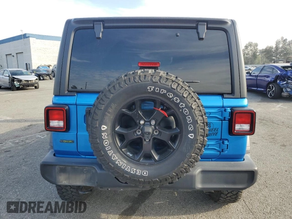2022 Jeep Wrangler Unlimited Willys with VIN 1C4HJXDM0NW152614, listed as a Copart auction lot 83208664 with 51,913 mi miles and Salvage Title. Bid and sale history available at DreamBid. Image 6.