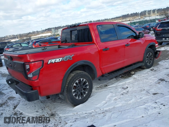 2021 Nissan Titan Pro-4X with VIN 1N6AA1ED6MN532524, listed as a IAAI auction lot 41225606 with 44,225 mi miles and . Bid and sale history available at DreamBid. Image 4.