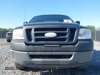 2007 Ford F-150 XL with VIN 1FTRF12297NA81619, listed as a IAAI auction lot 41855562 with 310,954 mi miles. Bid and sale history available at carsss.com. Image 6.