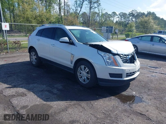 2013 Cadillac SRX Luxury Collection with VIN 3GYFNCE33DS608040, listed as a IAAI auction lot 41912860 with 128,295 mi miles and . Bid and sale history available at DreamBid. Image 1.