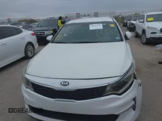 2016 Kia Optima LX with VIN KNAGT4L39G5104726, listed as a IAAI auction lot 40950914 with 128,728 mi miles. Bid and sale history available at carsss.com. Image 12.