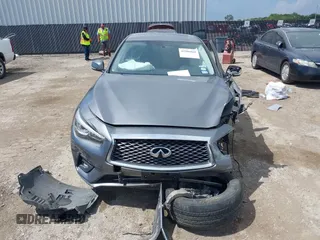 2021 Infiniti Q50 Pure with VIN JN1EV7AP7MM700241, listed as a IAAI auction lot 42586868 with 96,046 mi miles and . Bid and sale history available at DreamBid. Image 12.