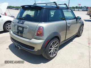 2009 MINI Hardtop S with VIN WMWMF73529TX40576, listed as a IAAI auction lot 42462085 with 77,936 mi miles and . Bid and sale history available at DreamBid. Image 4.