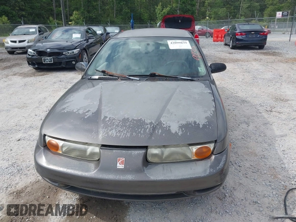 2000 Saturn SL z VIN 1G8ZK527XYZ121984, wystawiony jako IAAI lot #42099839 z przebiegiem 174 210 mil mil oraz . Historia ofert i sprzedaży dostępna na DreamBid. Obrazek 12.