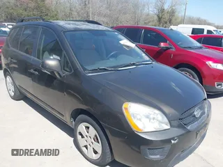 2009 Kia Rondo LX with VIN KNAFG528397221521, listed as a IAAI auction lot 41823879 with 143,600 mi miles. Bid and sale history available at carsss.com. Image 1.
