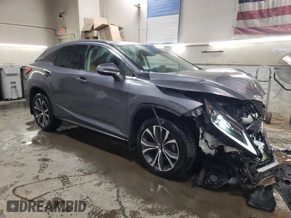 2021 Lexus RX with VIN 2T2HZMDAXMC307489, listed as a Copart auction lot 52098545 with 53,695 mi miles and Salvage Title. Bid and sale history available at carsss.com. Image 4.
