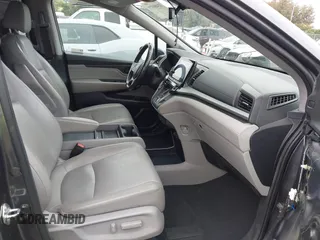 2018 Honda Odyssey Touring with VIN 5FNRL6H88JB062213, listed as a IAAI auction lot 42489379 with 90,578 mi miles and . Bid and sale history available at DreamBid. Image 5.