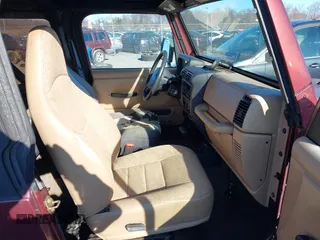 2002 Jeep Wrangler SE with VIN 1J4FA29PX2P748357, listed as a IAAI auction lot 41828109 with 93,941 mi miles and . Bid and sale history available at DreamBid. Image 5.