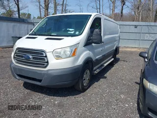 2015 Ford Transit Cargo with VIN 1FTNR1ZM9FKA56829, listed as a IAAI auction lot 42016014 with 261,768 mi miles. Bid and sale history available at carsss.com. Image 2.