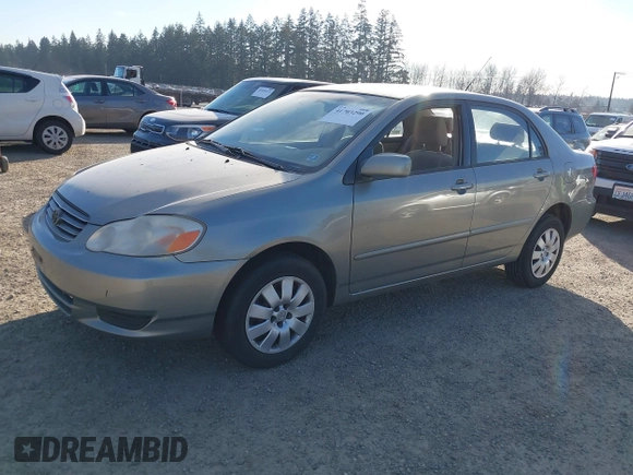 2004 Toyota Corolla CE with VIN JTDBR38E842043849, listed as a IAAI auction lot 41703290 with 299,999 mi miles. Bid and sale history available at carsss.com. Image 2.