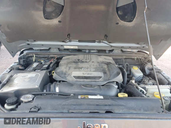 2014 Jeep Wrangler Unlimited Rubicon with VIN 1C4HJWFG9EL199501, listed as a Copart auction lot 61443595 with 86,940 mi miles and Salvage title. Bid and sale history available at DreamBid. Image 11.